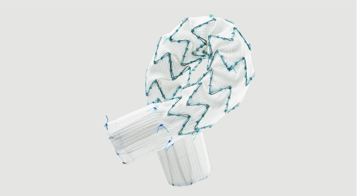 Image of Zenith® Spiral-Z® AAA Iliac Leg Graft being curved without kinking.