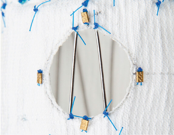 Close up of Zenith® Fenestrated endovascular graft large fenestration.