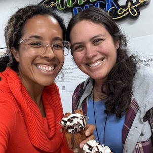 Cook employees enjoy churros during a Hispanic Heritage Month
